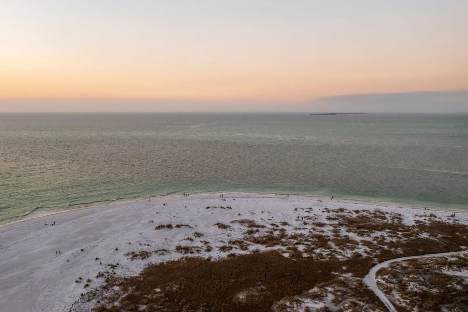 Aerial view of Bean Point on Anna Maria Island at sunset. Photo via Bradenton Gulf Islands.